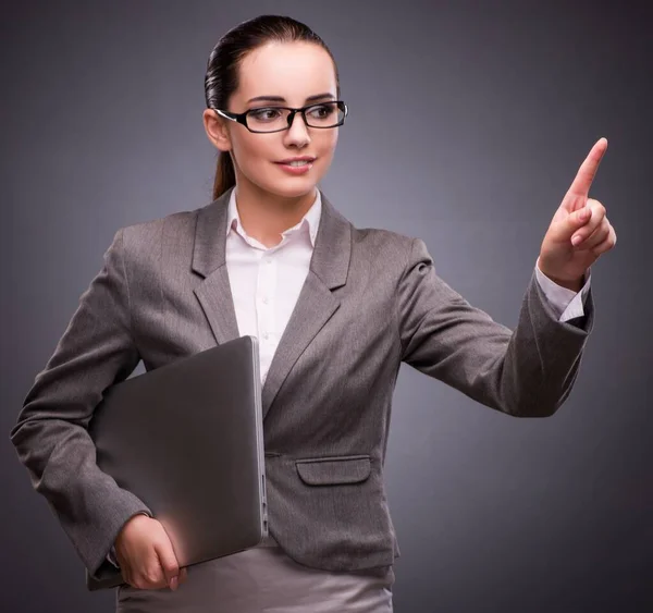 Businesswoman with laptop in business concept — Stock Photo, Image