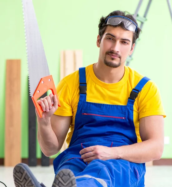 Professional contractor laying flooring at home — Stock Photo, Image