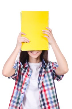 Kitapları olan genç bir öğrenci beyazlara izole edilmiş.