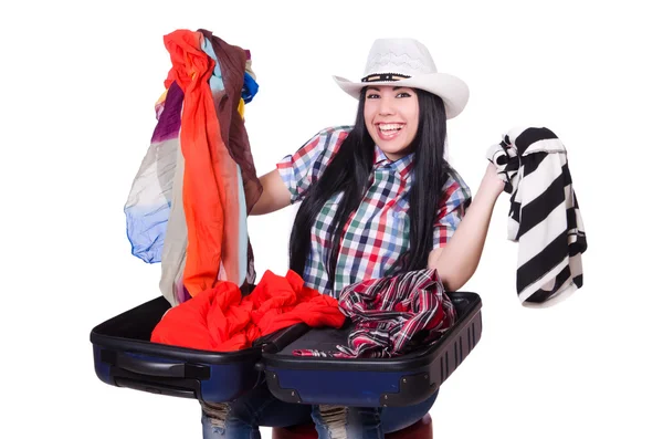 Woman trying to pack too much isolated on white — Stock Photo, Image