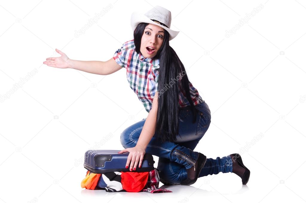 Woman trying to pack too much isolated on white