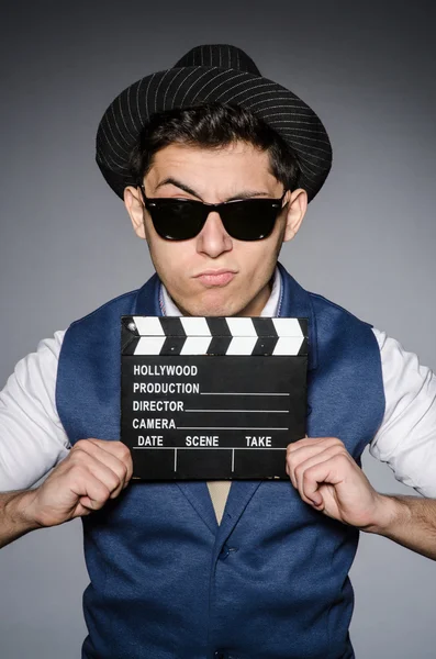 Funny man with movie clapper — Stock Photo, Image