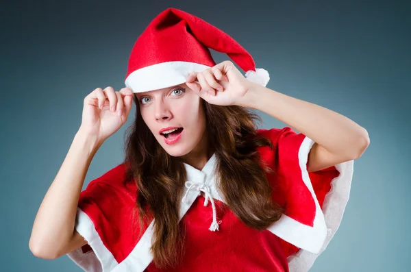 Sníh santa girl v červeným kostýmu — Stock fotografie