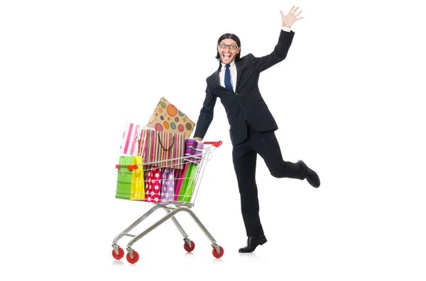 Uomo shopping con carrello supermercato isolato su bianco — Foto Stock