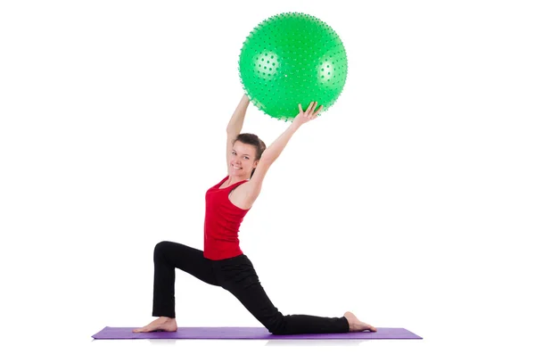 Young woman exercising with swiss ball — Stock Photo, Image