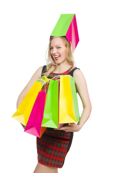 Kvinna efter shopping spree på vitt — Stockfoto