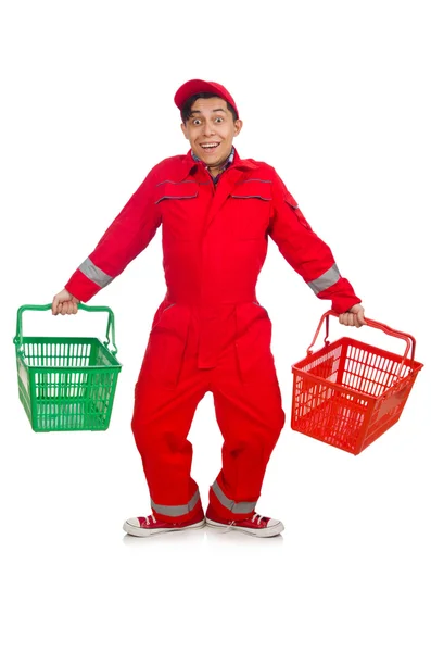 Man in red coveralls with shopping supermarket cart trolley — Stock Photo, Image