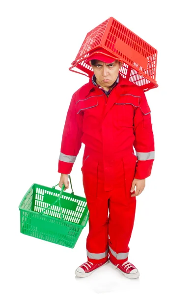 Muž v červené kombinéze s nákupním vozíkem — Stock fotografie