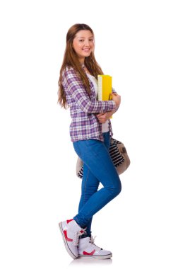 Kitapları olan genç bir öğrenci beyazlara izole edilmiş.