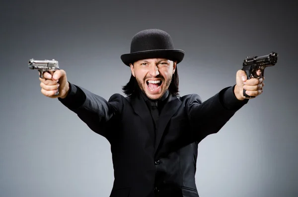 Hombre con sombrero vintage con pistola —  Fotos de Stock