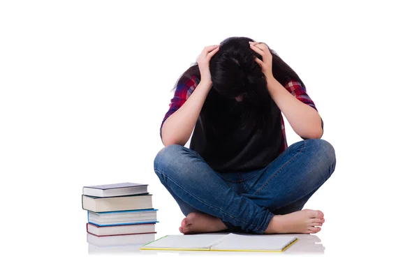 Joven estudiante con libros aislados en blanco — Foto de Stock