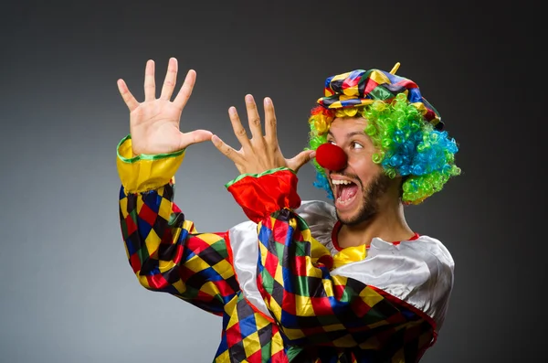 Funny clown in colourful costume — Stock Photo, Image