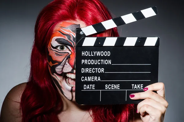 Woman with tiger face in halloween concept — Stock Photo, Image