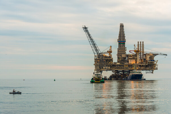 Oil rig platform in the calm sea