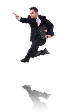 Zıplayan iş adamı beyazların arasında.