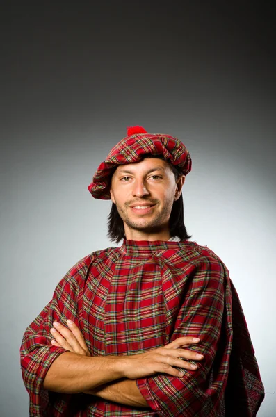 Funny scotsman in traditional clothing — Stock Photo, Image