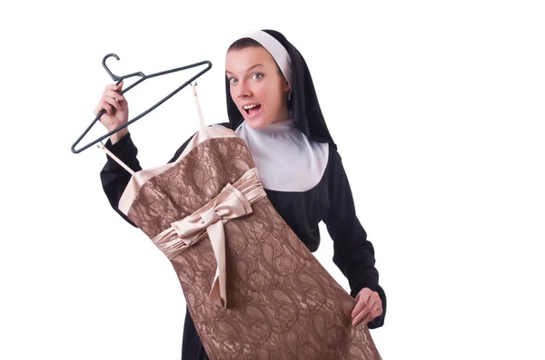 Nonne wählt Kleidung auf dem Kleiderbügel isoliert auf weiß — Stockfoto