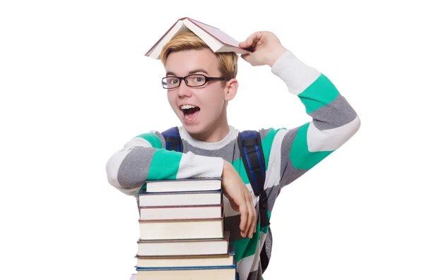 Estudante engraçado com pilha de livros — Fotografia de Stock