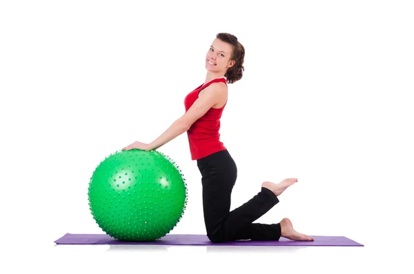 Young woman exercising with swiss ball — Stock Photo, Image