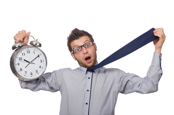 Man met klok probeert te voldoen aan de deadline geïsoleerd op wit — Stockfoto