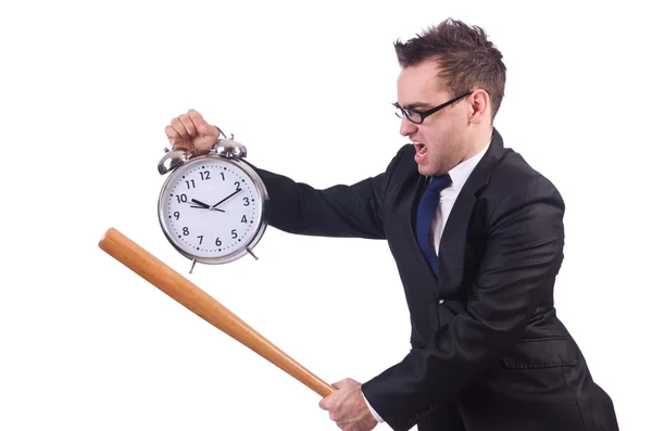 Hombre golpeando el reloj con bate de béisbol aislado en el blanco — Foto de Stock