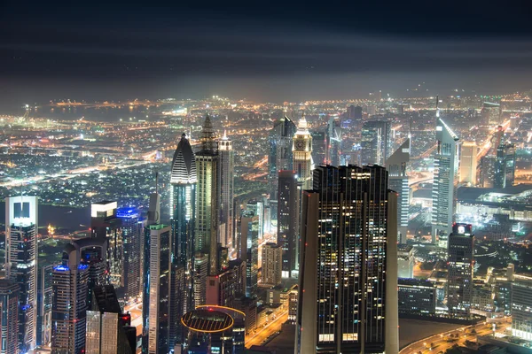 Panoram of night Dubai during sunset — Stock Photo, Image