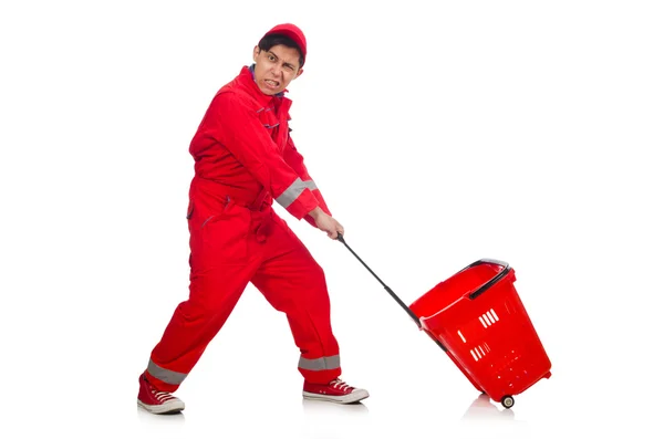 Mann in roten Overalls mit Einkaufswagen — Stockfoto