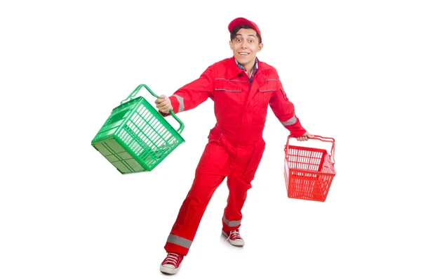 Man in red coveralls with shopping supermarket cart trolley — Stock Photo, Image