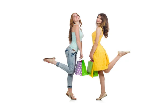 Amigos com sacos de compras isolados em branco — Fotografia de Stock