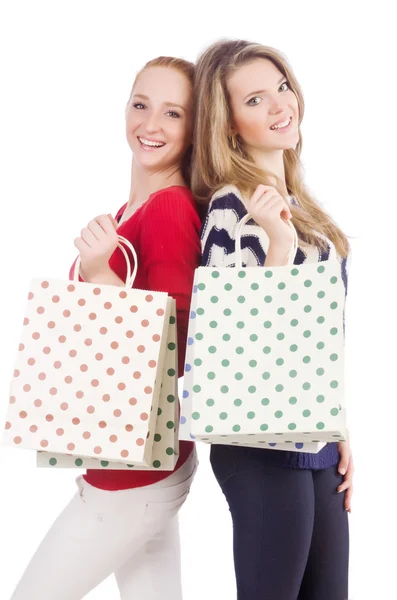 Amici con shopping bags isolati su bianco — Foto Stock