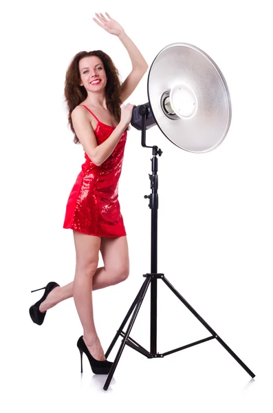 Woman in red dress posing in the studio — Stock Photo, Image