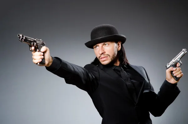 Hombre con sombrero vintage con pistola —  Fotos de Stock