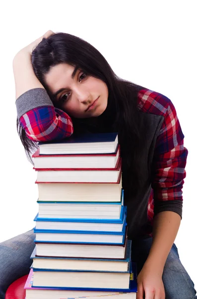 Joven estudiante con libros aislados en blanco — Foto de Stock