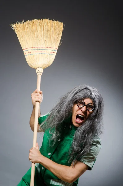 Funny man with brush and wig — Stock Photo, Image