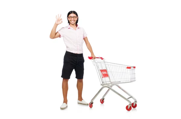Mann kauft mit Einkaufswagen im Supermarkt ein — Stockfoto