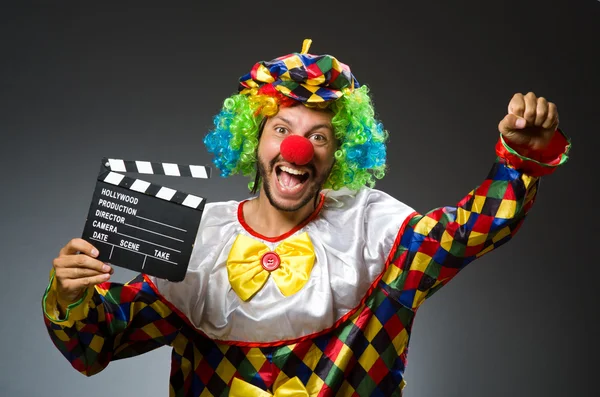 Clown avec film clapper conseil — Photo