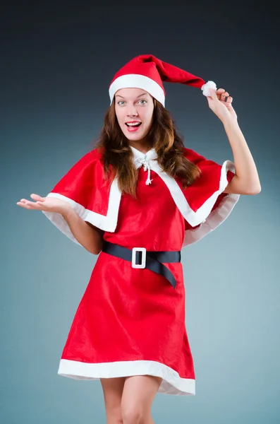 Santa meisje in rood kostuum sneeuw — Stockfoto