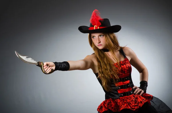 Woman pirate with sharp weapon — Stock Photo, Image