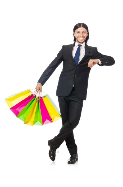Muž s nákupními taškami izolované na bílém — Stock fotografie