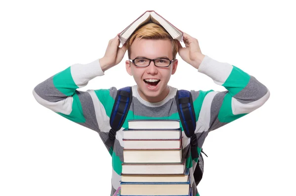 Estudante engraçado com pilha de livros — Fotografia de Stock