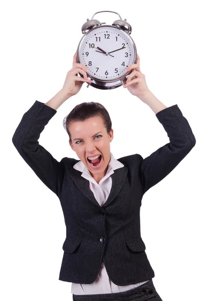 Businesswoman with clock missing her deadlines — Stock Photo, Image