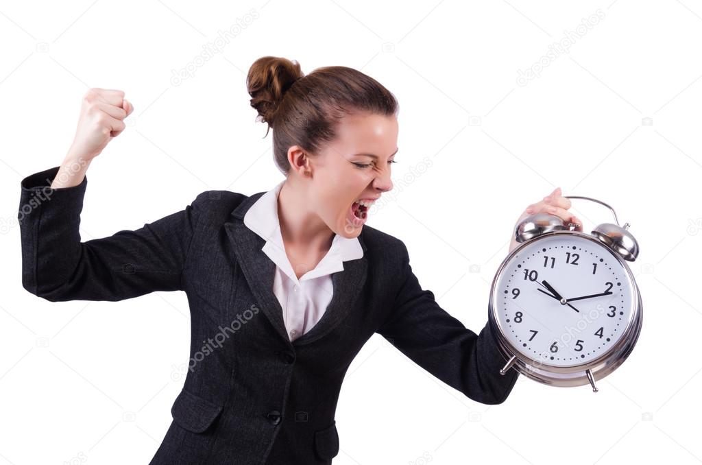 Businesswoman with clock missing her deadlines