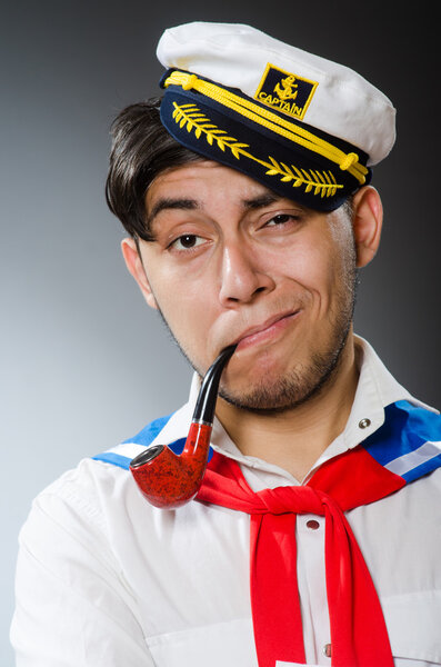 Funny captain sailor wearing hat