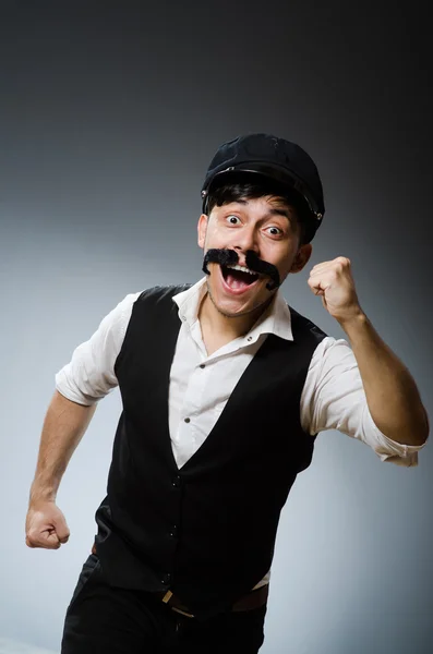 Funny taxi driver wearing peaked cap — Stock Photo, Image