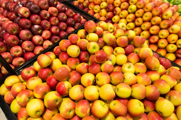 Apple stall in big supermarket — Stock Photo, Image