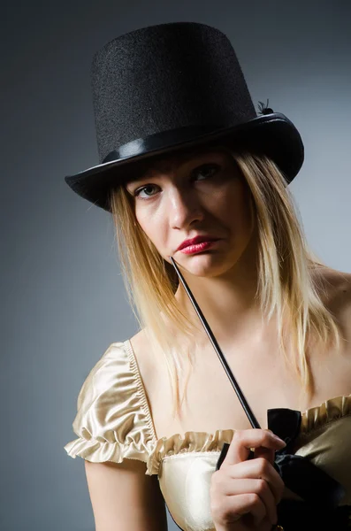 Woman magician with magic wand and hat — Stock Photo, Image