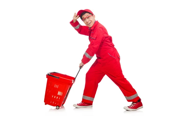 Man in red coveralls with shopping supermarket cart trolley — Stock Photo, Image