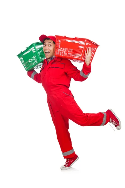 Man in red coveralls with shopping supermarket cart trolley — Stock Photo, Image