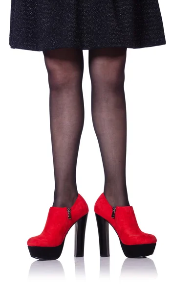 女人腿带上白色孤立的红舞鞋 — 图库照片