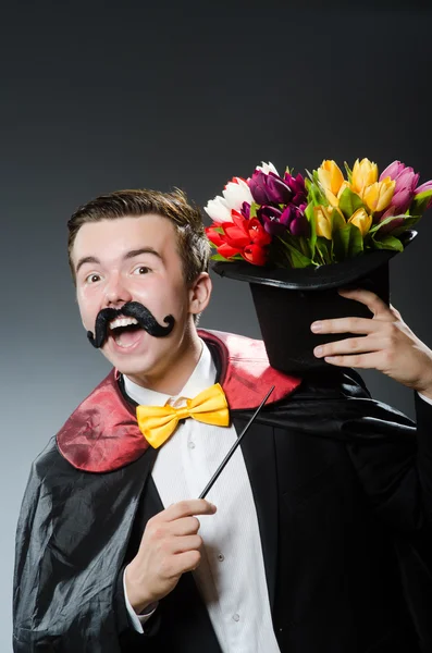 Funny magician with wand and hat — Stock Photo, Image